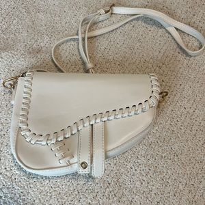 Francesca’s white cross body bag